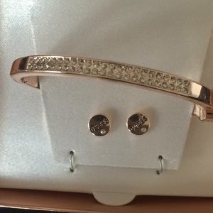 Guess Jewelry - Guess rose gold earring and bracelet set Guess Jewelry - Guess rose gold earring and bracelet set